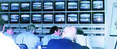 Scene in Race Control during the World Motorcycle Grand Prix held at Phakisa, Welkom.  The monitor on the far left in the bottom row receives live feed from the local broadcaster